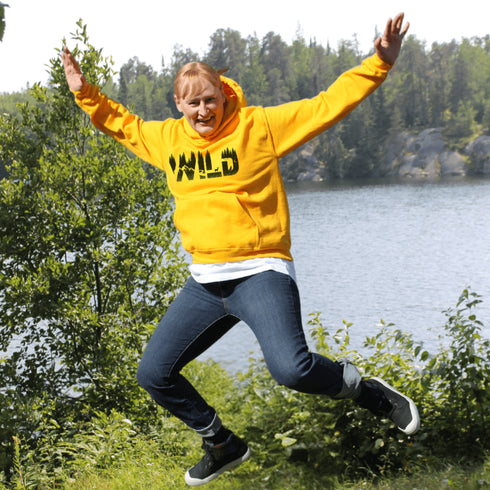 Step into the wild with our unique camping hoodie, featuring a captivating camping scene intricately etched inside the words "Into The Wild". Crafted for outdoor enthusiasts, this hoodie is not just a piece of clothing but a symbol of adventure and exploration.