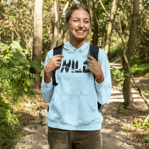 Step into the wild with our unique camping hoodie, featuring a captivating camping scene intricately etched inside the words "Into The Wild". Crafted for outdoor enthusiasts, this hoodie is not just a piece of clothing but a symbol of adventure and exploration.
