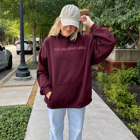 This embroidered hoodie is for the unapologetic cat person who knows that every meow, toe bean, and zoomie is worth sharing with the world.