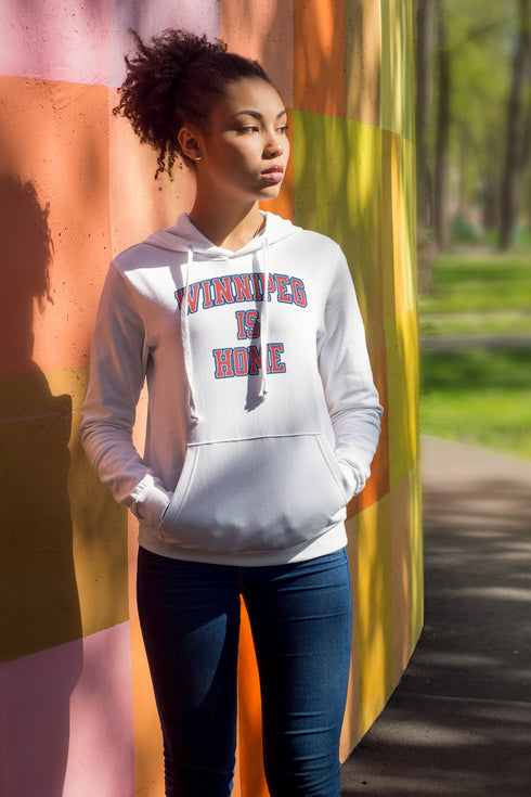Introducing the ultimate statement of pride and comfort: the "Winnipeg Is Home" Hoodie. Designed for those who hold Winnipeg close to their heart, this hoodie is more than just a piece of clothing—it's a declaration of love for the heart of the prairies.