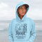 Cozy up in coastal charm with our Winnipeg Beach Doodle Hoodie, inspired by the laid-back vibe of one of Manitoba’s most beloved lakeside getaways.