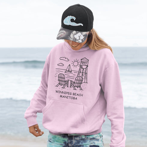 Cozy up in coastal charm with our Winnipeg Beach Doodle Hoodie, inspired by the laid-back vibe of one of Manitoba’s most beloved lakeside getaways.