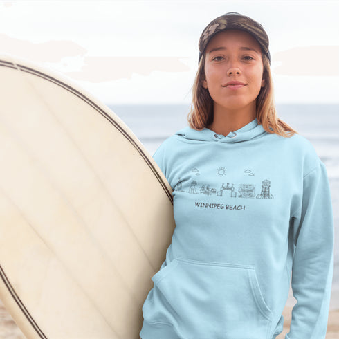 Show off your lake town pride with this cozy Winnipeg Beach Landmark Doodle Hoodie. Featuring a charming, hand-drawn skyline of iconic Winnipeg Beach sights.