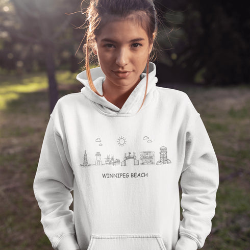 Show off your lake town pride with this cozy Winnipeg Beach Landmark Doodle Hoodie. Featuring a charming, hand-drawn skyline of iconic Winnipeg Beach sights.