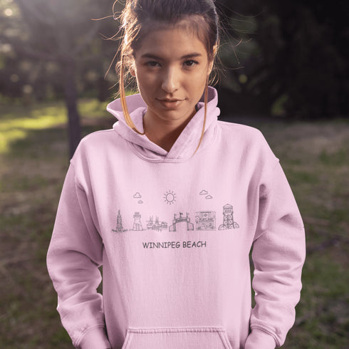Show off your lake town pride with this cozy Winnipeg Beach Landmark Doodle Hoodie. Featuring a charming, hand-drawn skyline of iconic Winnipeg Beach sights.
