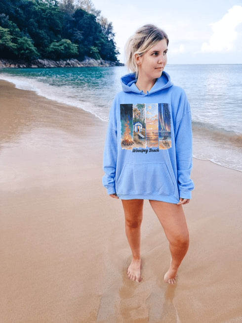 Inspired by the timeless charm of Winnipeg Beach, this cozy hoodie features a beautifully detailed watercolor collage capturing the spirit of this beloved lakeside destination.