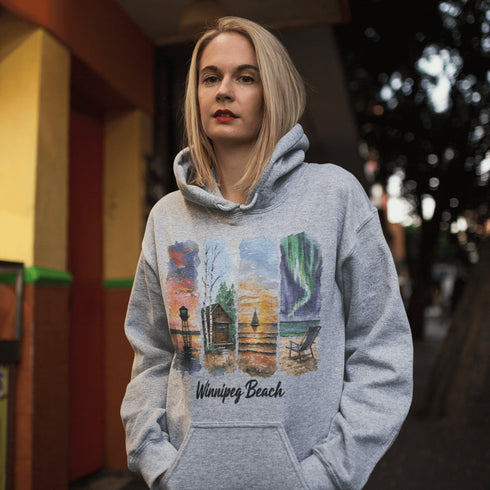 Bring the peaceful charm of Winnipeg Beach with you wherever you go. This soft, comfortable hoodie features a watercolor-style collage celebrating the beauty of Manitoba’s cherished lakeside town.