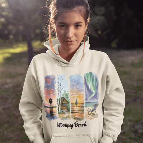Bring the peaceful charm of Winnipeg Beach with you wherever you go. This soft, comfortable hoodie features a watercolor-style collage celebrating the beauty of Manitoba’s cherished lakeside town.