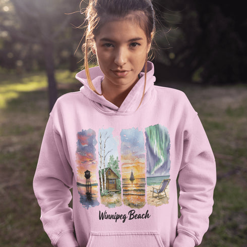 Bring the peaceful charm of Winnipeg Beach with you wherever you go. This soft, comfortable hoodie features a watercolor-style collage celebrating the beauty of Manitoba’s cherished lakeside town.
