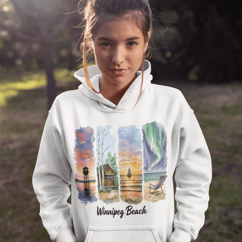 Bring the peaceful charm of Winnipeg Beach with you wherever you go. This soft, comfortable hoodie features a watercolor-style collage celebrating the beauty of Manitoba’s cherished lakeside town.