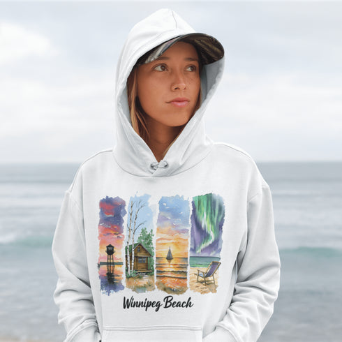 Bring the peaceful charm of Winnipeg Beach with you wherever you go. This soft, comfortable hoodie features a watercolor-style collage celebrating the beauty of Manitoba’s cherished lakeside town.