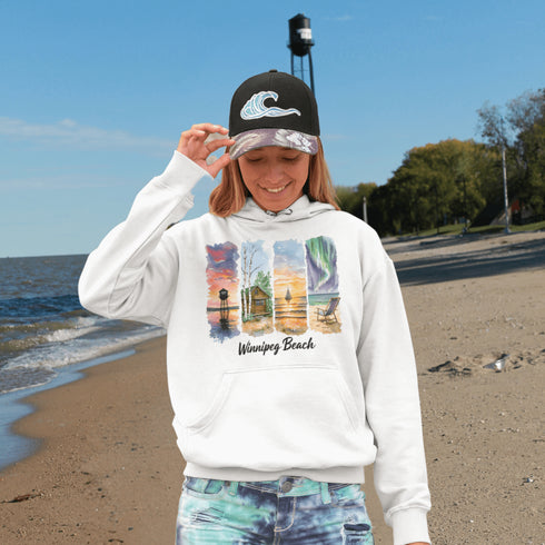 Bring the peaceful charm of Winnipeg Beach with you wherever you go. This soft, comfortable hoodie features a watercolor-style collage celebrating the beauty of Manitoba’s cherished lakeside town.