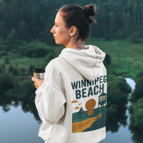 Step into vintage beach town vibes with our Winnipeg Beach Retro Scene hoodie — a stylish throwback to sun-soaked days by the lake.