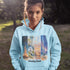 Inspired by the timeless charm of Winnipeg Beach, this cozy hoodie features a beautifully detailed watercolor collage capturing the spirit of this beloved lakeside destination.