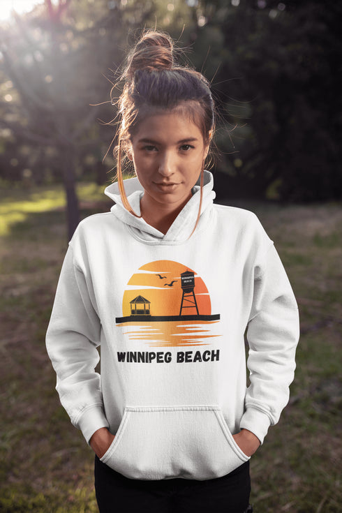 Introducing the "Winnipeg Beach Sunset Hoodie" – because nothing says relaxation like a sunset and a water tower! Whether you're reminiscing about lazy beach days or just need an excuse to wear something cozy, this hoodie captures all the magic of Winnipeg Beach.