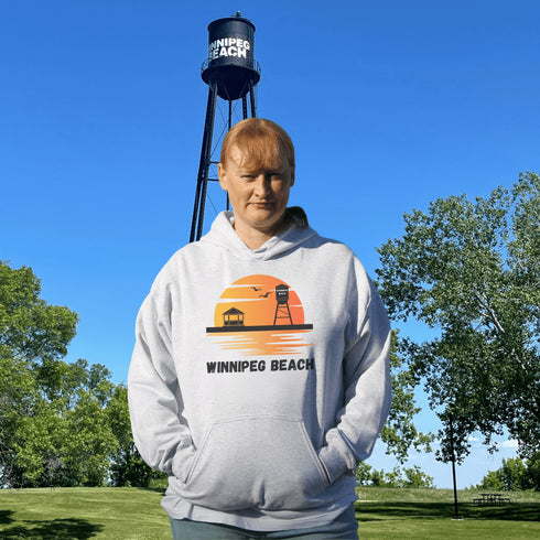 Introducing the "Winnipeg Beach Sunset Hoodie" – because nothing says relaxation like a sunset and a water tower! Whether you're reminiscing about lazy beach days or just need an excuse to wear something cozy, this hoodie captures all the magic of Winnipeg Beach.