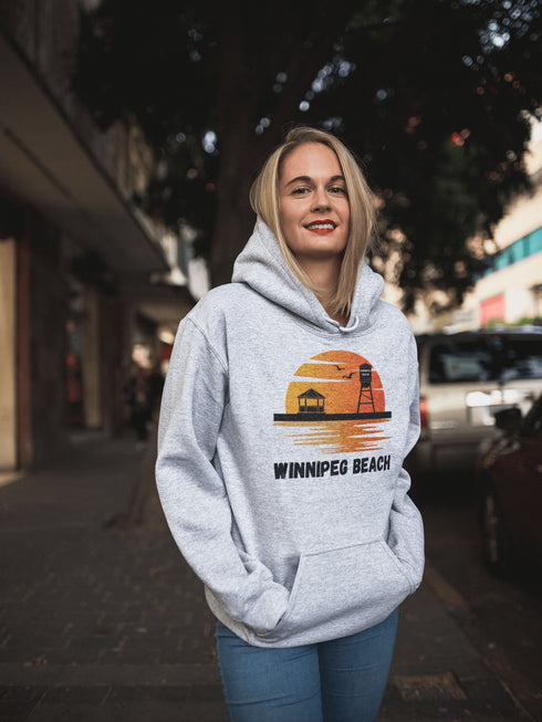 Introducing the "Winnipeg Beach Sunset Hoodie" – because nothing says relaxation like a sunset and a water tower! Whether you're reminiscing about lazy beach days or just need an excuse to wear something cozy, this hoodie captures all the magic of Winnipeg Beach.