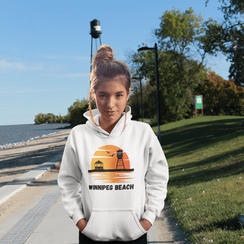 Introducing the "Winnipeg Beach Sunset Hoodie" – because nothing says relaxation like a sunset and a water tower! Whether you're reminiscing about lazy beach days or just need an excuse to wear something cozy, this hoodie captures all the magic of Winnipeg Beach.