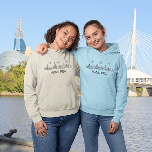 Show your city pride in style with our Winnipeg Doodle Art hoodie — a cozy tribute to the heart of Manitoba, wrapped in minimalist charm.