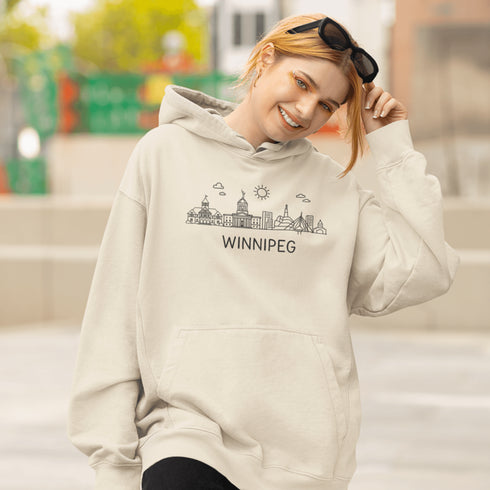 Show your city pride in style with our Winnipeg Doodle Art hoodie — a cozy tribute to the heart of Manitoba, wrapped in minimalist charm.