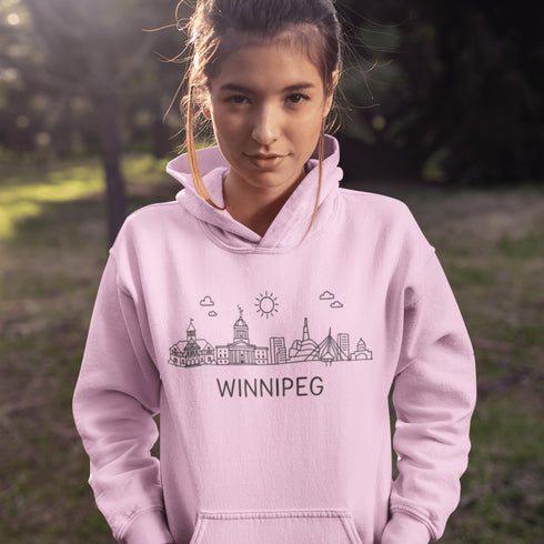 Show your city pride in style with our Winnipeg Doodle Art hoodie — a cozy tribute to the heart of Manitoba, wrapped in minimalist charm.