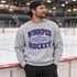 Winnipeg Hockey 1972 vintage-style unisex crewneck sweatshirt with collegiate lettering, crossed hockey sticks and retro hockey graphic by Prairie Life Co.