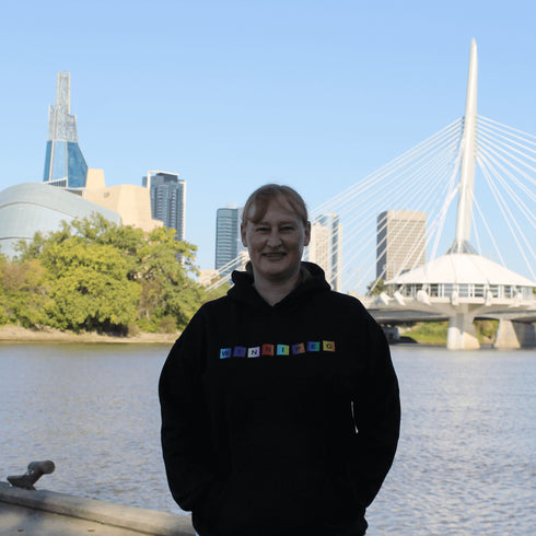 Whether you’re spelling out your love for the city or just trying to score major style points, this hoodie has you covered. Featuring colorful Scrabble tiles that spell "Winnipeg," it's the perfect choice for anyone who loves the Peg and appreciates a good word game.