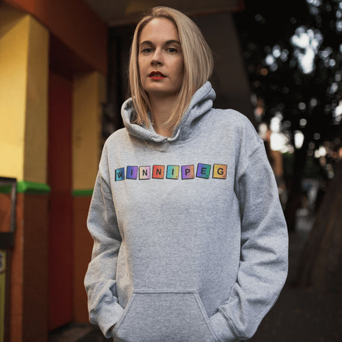 Whether you’re spelling out your love for the city or just trying to score major style points, this hoodie has you covered. Featuring colorful Scrabble tiles that spell "Winnipeg," it's the perfect choice for anyone who loves the Peg and appreciates a good word game.