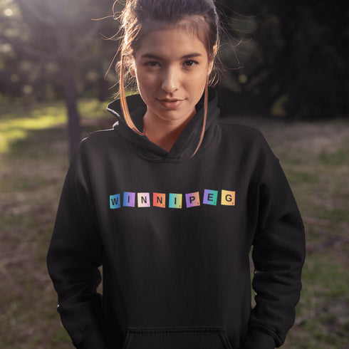 Whether you’re spelling out your love for the city or just trying to score major style points, this hoodie has you covered. Featuring colorful Scrabble tiles that spell "Winnipeg," it's the perfect choice for anyone who loves the Peg and appreciates a good word game.