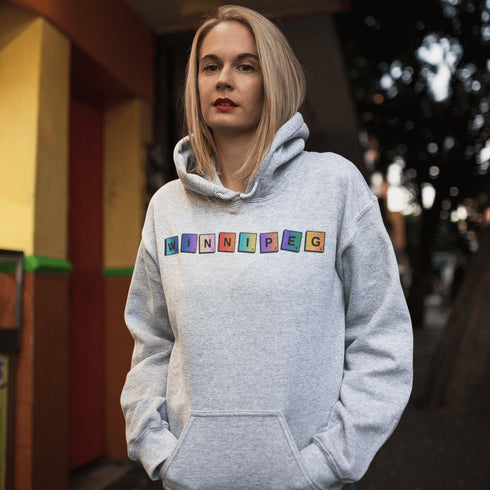 Whether you’re spelling out your love for the city or just trying to score major style points, this hoodie has you covered. Featuring colorful Scrabble tiles that spell "Winnipeg," it's the perfect choice for anyone who loves the Peg and appreciates a good word game.