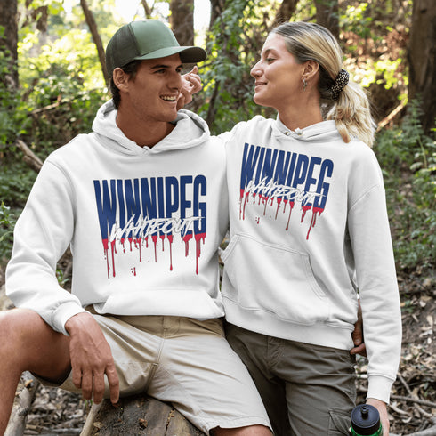 Get ready to paint the playoffs white—literally! This hoodie features Winnipeg Whiteout splashed across the front in a drippy paint font.