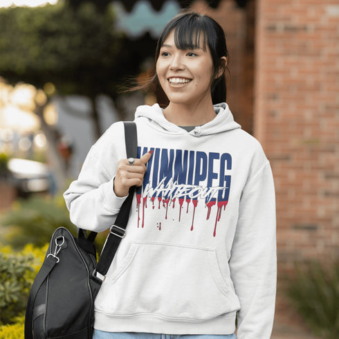 Get ready to paint the playoffs white—literally! This hoodie features Winnipeg Whiteout splashed across the front in a drippy paint font.