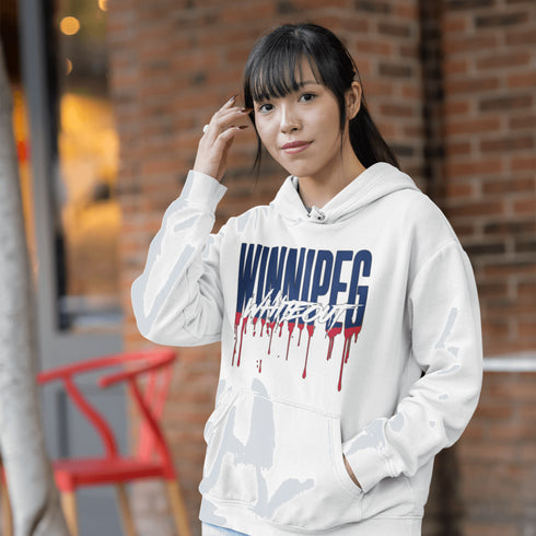 Get ready to paint the playoffs white—literally! This hoodie features Winnipeg Whiteout splashed across the front in a drippy paint font.