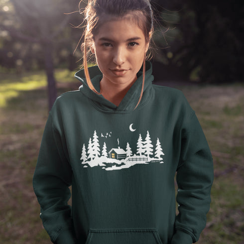 Wrap yourself in winter wonder with our Snowy Cabin Hoodie — a cozy escape you can wear.