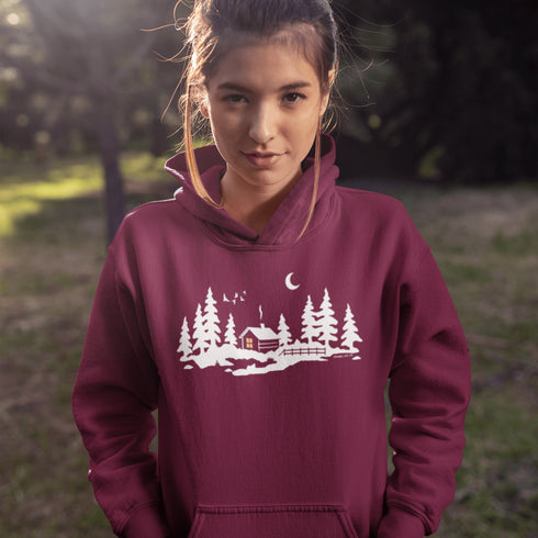 Wrap yourself in winter wonder with our Snowy Cabin Hoodie — a cozy escape you can wear.