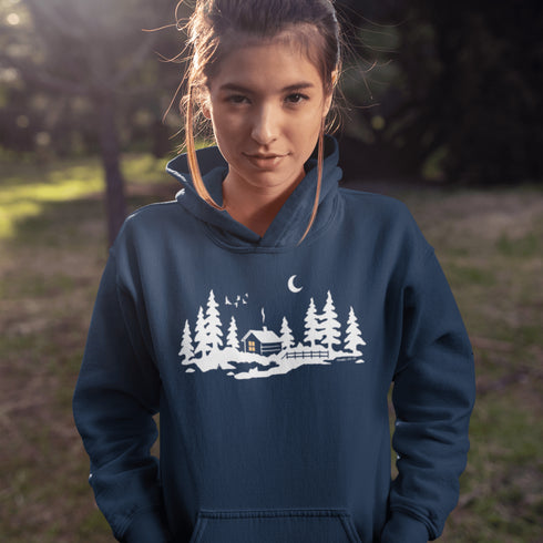 Wrap yourself in winter wonder with our Snowy Cabin Hoodie — a cozy escape you can wear.