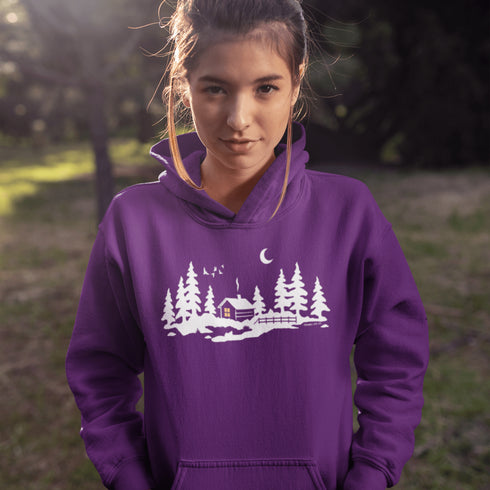 Wrap yourself in winter wonder with our Snowy Cabin Hoodie — a cozy escape you can wear.
