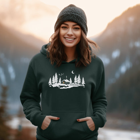 Wrap yourself in winter wonder with our Snowy Cabin Hoodie — a cozy escape you can wear.