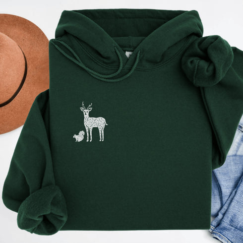 Featuring a collage of woodland animals on the back, this design captures the essence of nature's charm with creatures like foxes, bears and squirrels nestled among lush foliage.