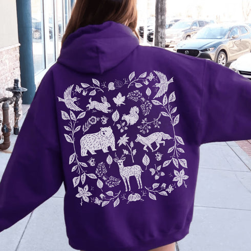 Featuring a collage of woodland animals on the back, this design captures the essence of nature's charm with creatures like foxes, bears and squirrels nestled among lush foliage.