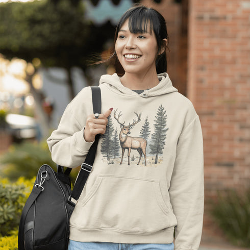This hoodie features a beautifully crafted design of a majestic deer standing amidst the forest, capturing the quiet elegance of the woods.