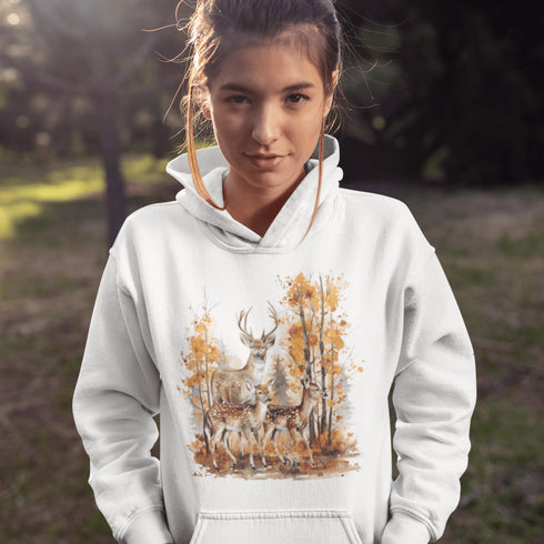 Step into the heart of fall with our Woodland Deer Hoodie, featuring a tender scene of a father deer with his two fawns in a peaceful autumn forest.
