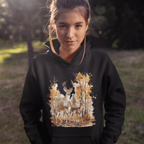 Step into the heart of fall with our Woodland Deer Hoodie, featuring a tender scene of a father deer with his two fawns in a peaceful autumn forest.