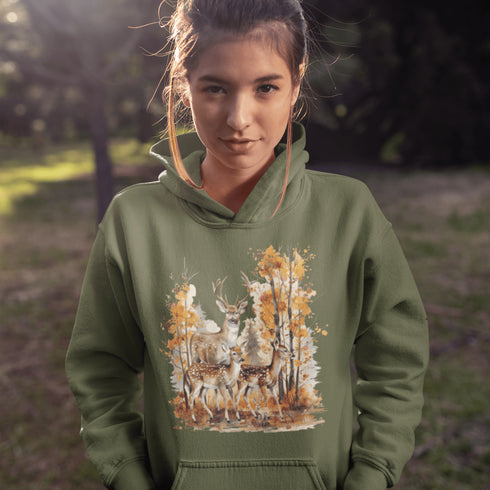 Step into the heart of fall with our Woodland Deer Hoodie, featuring a tender scene of a father deer with his two fawns in a peaceful autumn forest.