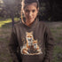 This beautifully crafted hoodie showcases a loving mother fox and her playful kit sitting in a cozy bed of fall foliage, surrounded by vibrant autumn leaves.