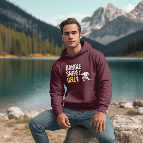 This cozy and stylish hoodie features a hockey player celebrating scoring a goal with the words "Dangle, Snipe, Celly" written on it.