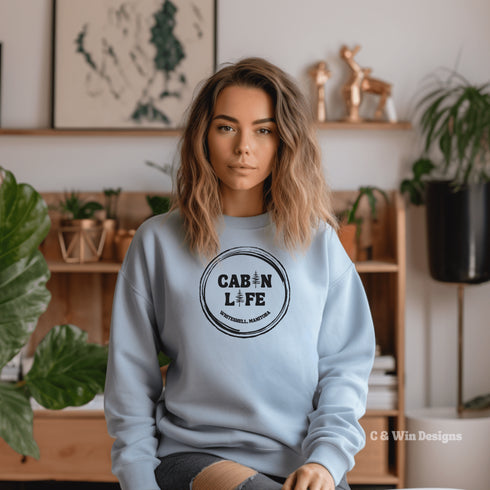 Our Cabin Life sweatshirt is perfect for those who love spending time in the great outdoors, whether it's camping, hiking, or simply enjoying a cozy night in a cabin.