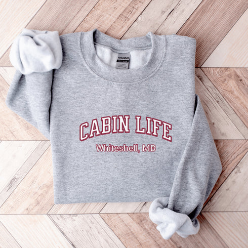 Introducing our customizable gender-neutral sweatshirt, perfect for anyone who loves cabin life and camping!