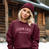 Introducing our customizable gender-neutral sweatshirt, perfect for anyone who loves cabin life and camping!