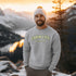Introducing our customizable gender-neutral sweatshirt, perfect for anyone who loves cabin life and camping!